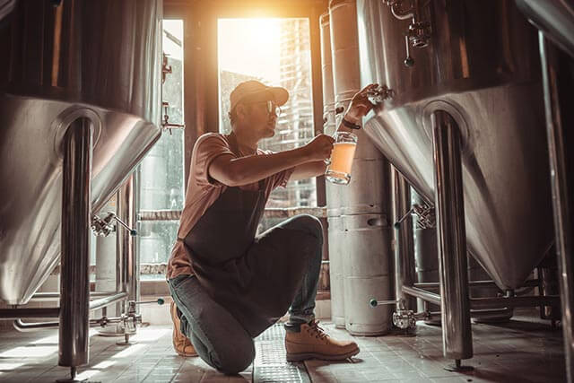 Brewer working at a brewery